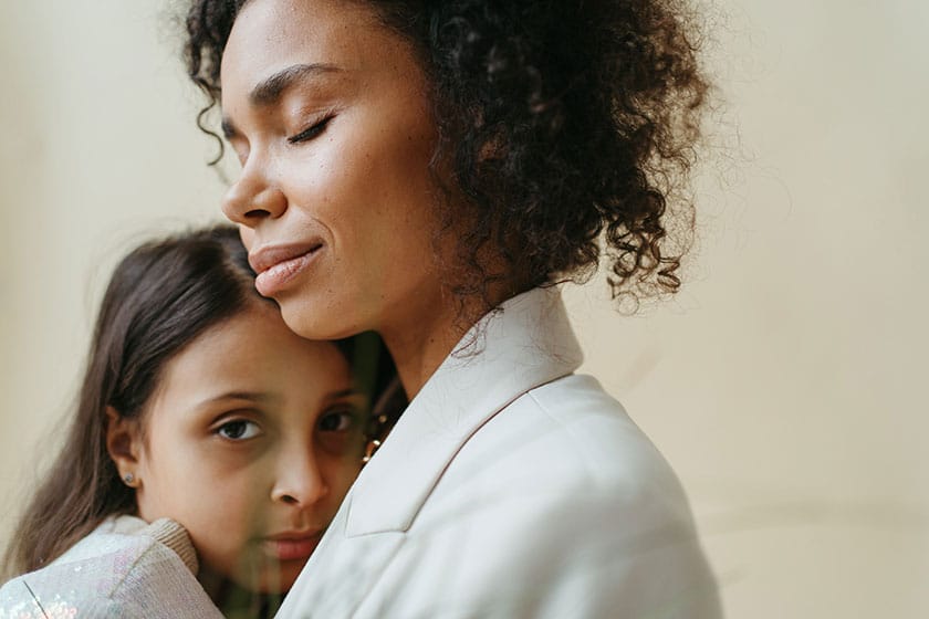 peaceful mother and daughter